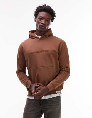 CAT WWR CAT WWR 300 gsm embroidered logo loose fit hoodie in brown