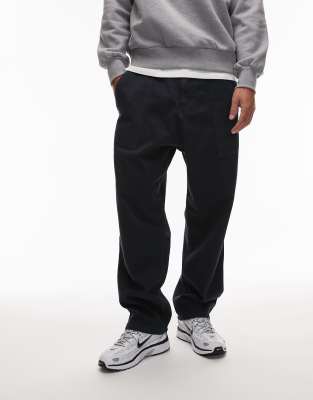 CAT WWR CAT WWR heavyweight twill buckle loose fit trousers in navy