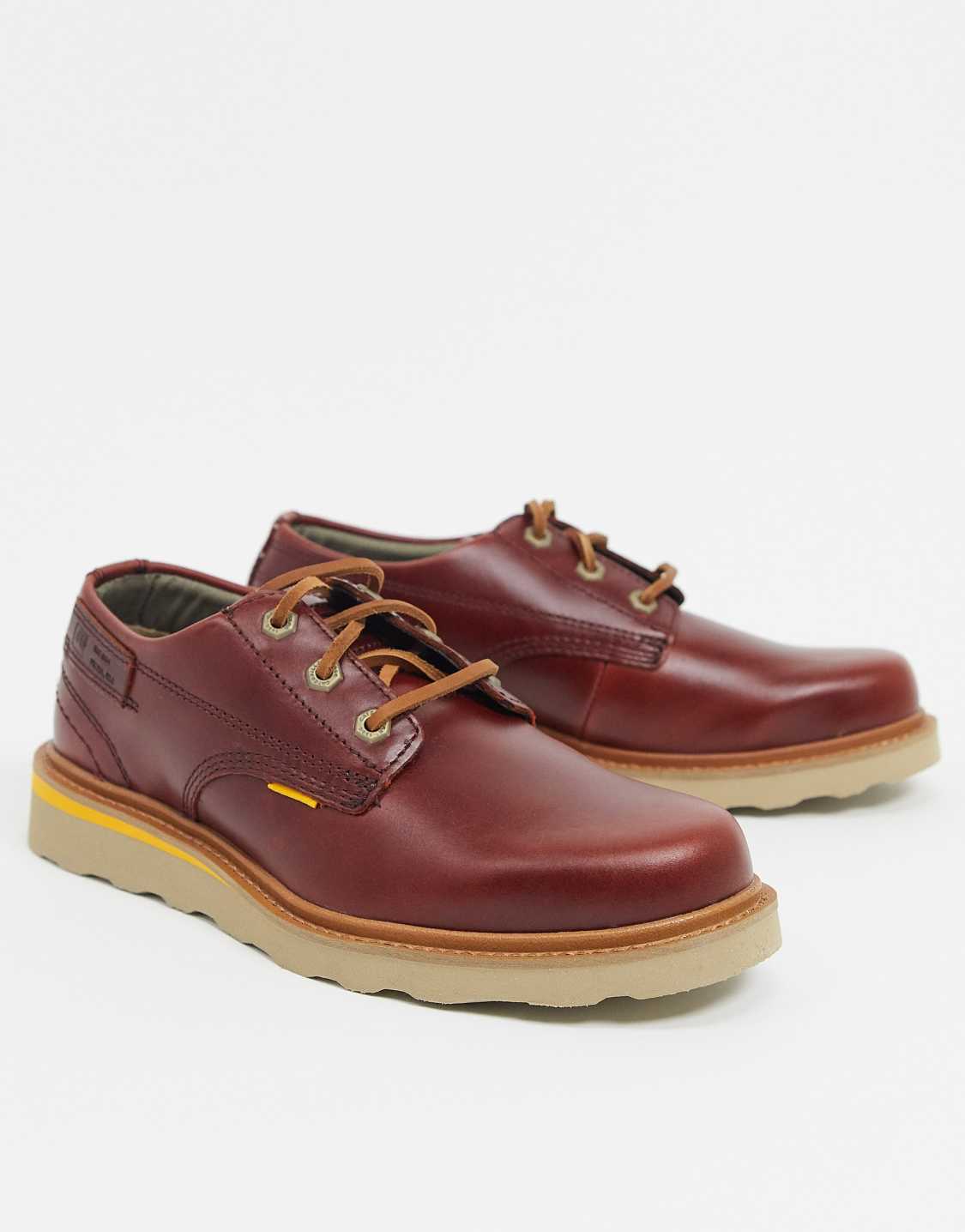 Cat oxford. Caterpillar Jackson Low. Катерпиллер Джексон ботинки. Низкие кожаные туфли винного цвета на шнуровке Caterpillar Jackson-красный. Обувь Caterpillar кожаные мужская.