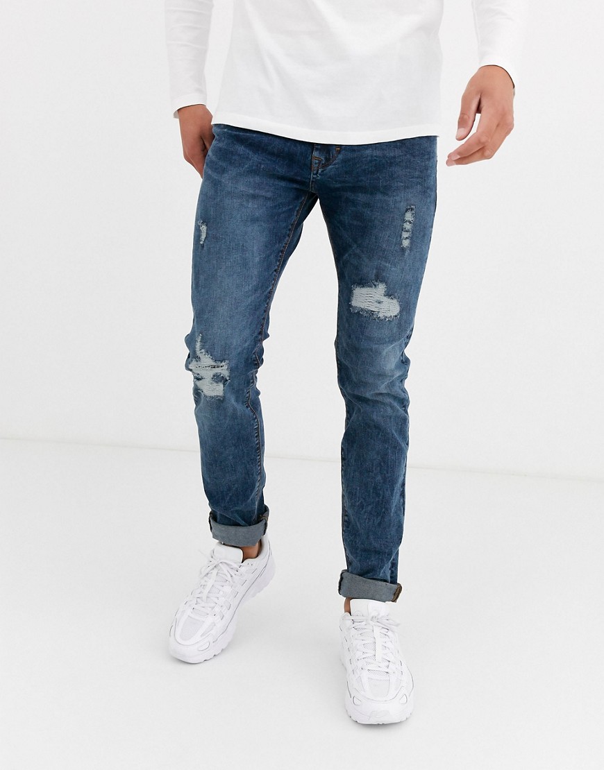Celio - Skinny jeans in mid wash met distressing-Blauw