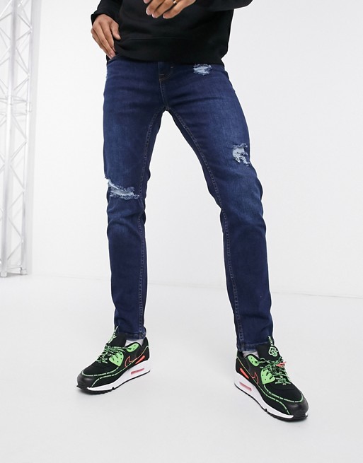 Celio slim jeans with rips in light wash