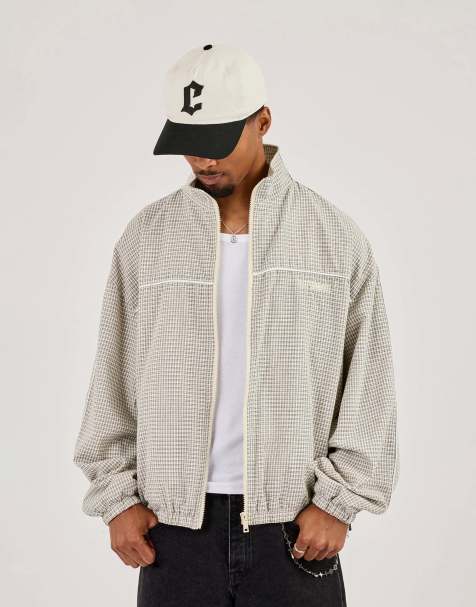 Cernucci Check funnel neck track jacket with piping in beige - view 1