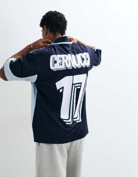 Cernucci – Fußballtrikot in Marineblau und Weiß mit V-Ausschnitt, Kragen, Bahnendesign und Logo - view 1