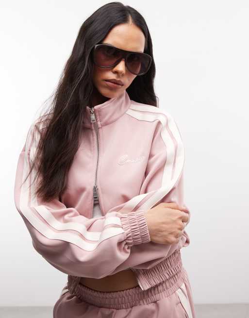Cernucci - Giacca corta rosa chiaro con collo a imbuto, zip doppia e fettuccia sulle maniche in coordinato