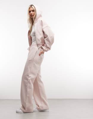 Jogginghose aus 100% Baumwolle in Hellrosa mit weitem Bein und Logo, Kombiteil Rosa M