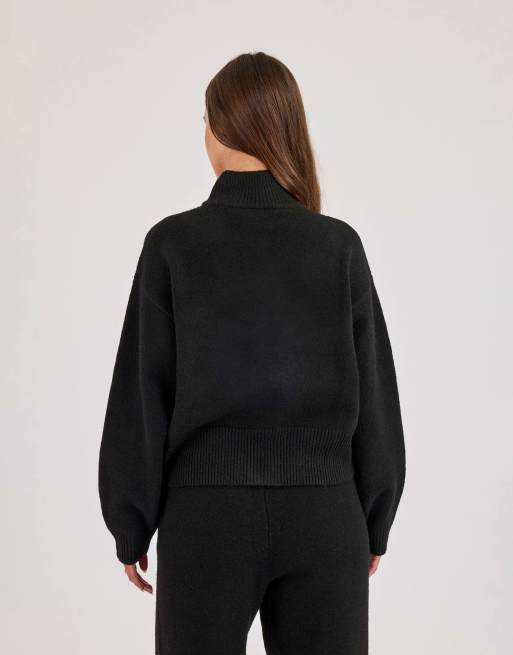 Cernucci Knitted embroidered logo funnel neck zip through in black, 3 of 4