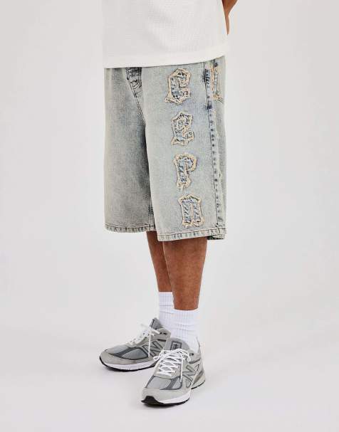 Cernucci Logo applique denim jorts in blue