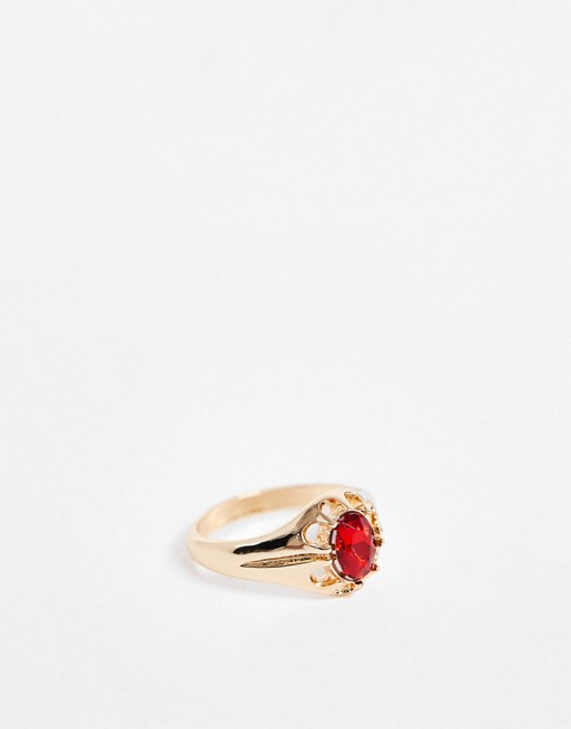 Chained & Able band ring with red stone in gold