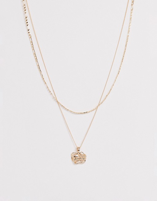 Chained & Able double layer neck chain with drama mask charm in gold