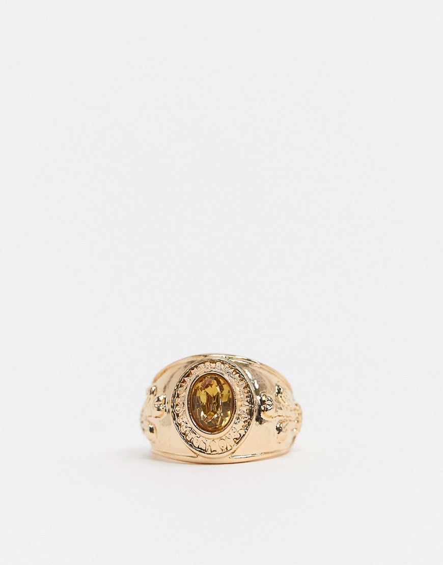 Chained & Able - Goudkleurige ring met oranje steen