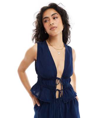Chaleco azul oscuro con lazadas delanteras de Mango (parte de un conjunto)