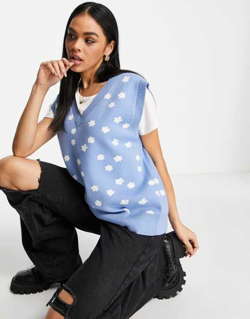 Chaleco azul polvoriento con estampado de flores de punto de NA-KD