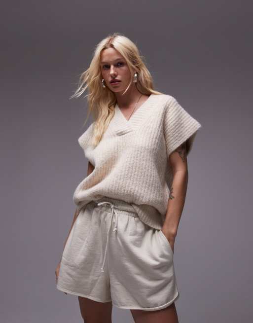 Chaleco color avena holgado con cuello de pico de punto acanalado mullido de Topshop