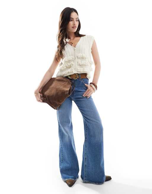 Chaleco color crema de estilo boho con flecos de punto de Miss