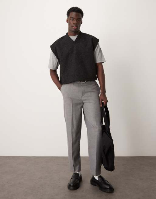 Chaleco corto negro extragrande de punto desflecado de ASOS DESIGN
