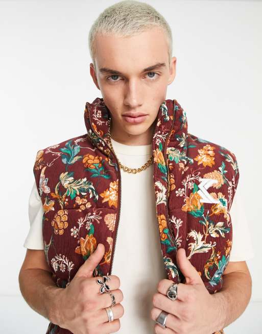 Chaleco de plumas multicolor con estampado de flores de estilo retro de pana de Karl Kani
