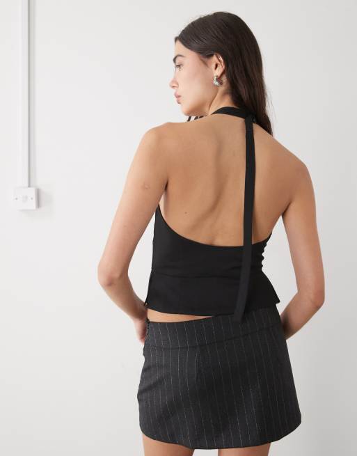 Chaleco de traje negro con cuello halter, espalda descubierta y cremallera delantera de Monki, 4 de 4