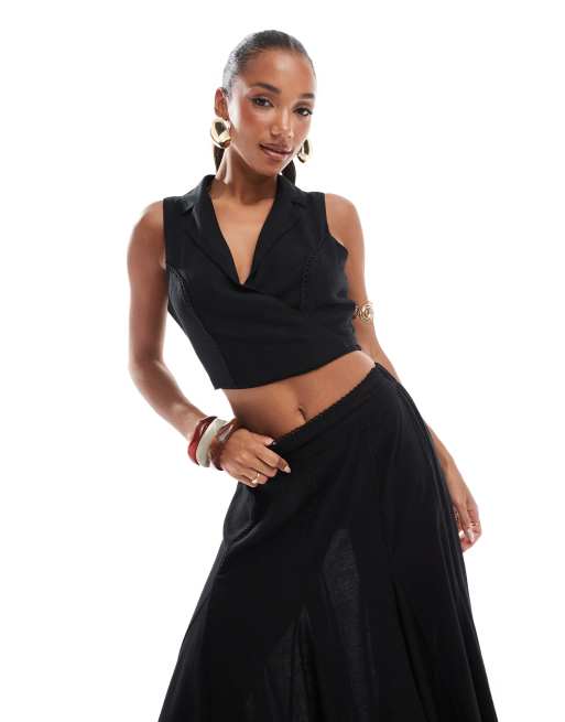 Chaleco negro con lazada delantera de lino de River Island (parte de un conjunto)