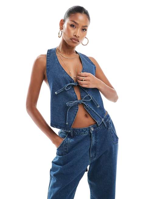 Chaleco vaquero azul medio con detalle de lazada de Aria Cove (parte de un conjunto)