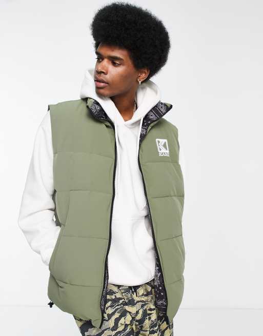 Chaleco verde acolchado y reversible con estampado de cachemir estilo retro de Karl Kani