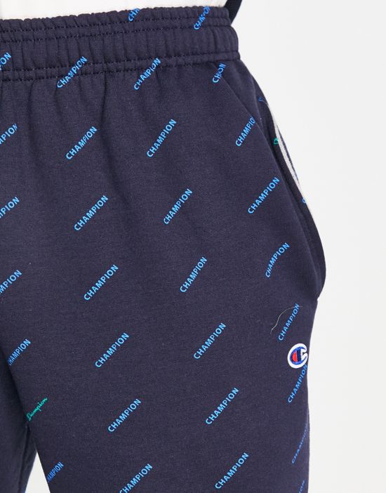 https://images.asos-media.com/products/champion-all-over-logo-print-sweatpants-in-navy/200873438-4?$n_550w$&wid=550&fit=constrain