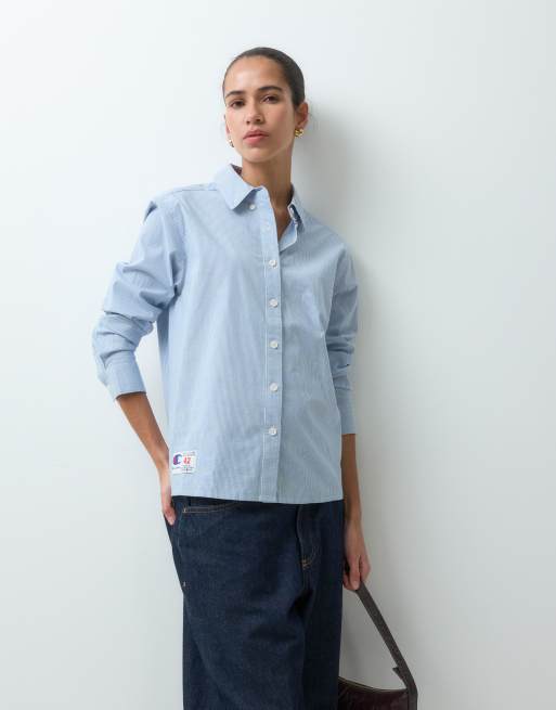Champion chemise boutonnée à rayures bleues avec imprimé au dos, 2 de 5