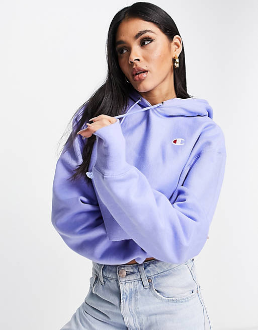 Champion cropped hoodie with small logo in blue | ASOS