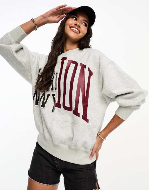 Champion Felpa grigia con logo applicato e scritta New York ASOS