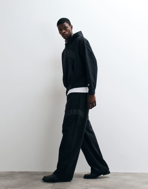 Champion Future Memories joggers oversize de bajo abierto en negro, 4 de 5