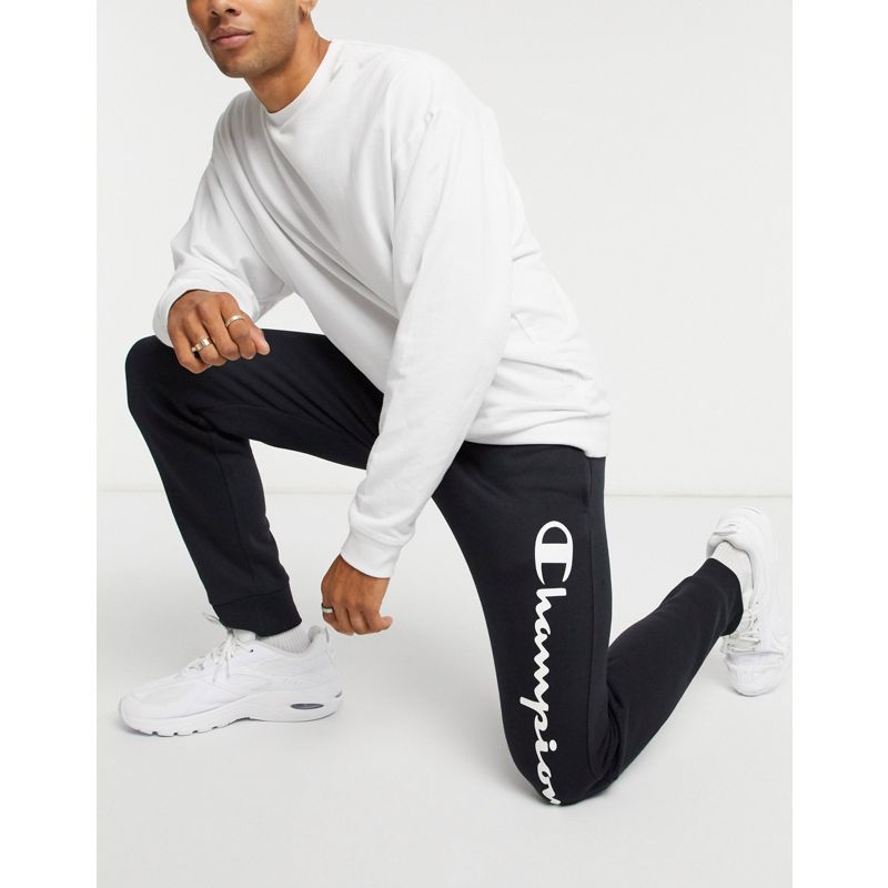 Uomo Pantaloni e leggings Champion - Joggers neri con logo grande 