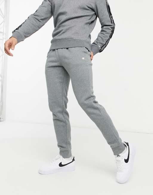 Champion Joggingbroek met klein logo en boorden in grijs