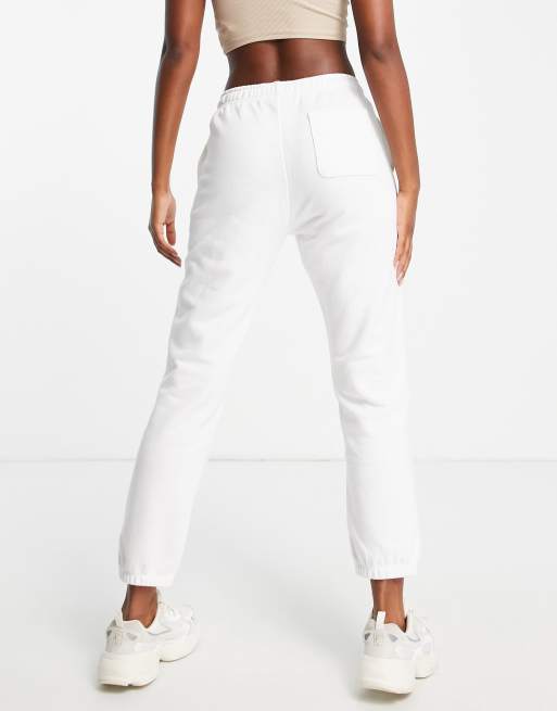 Champion Joggingbroek met klein logo in wit ASOS