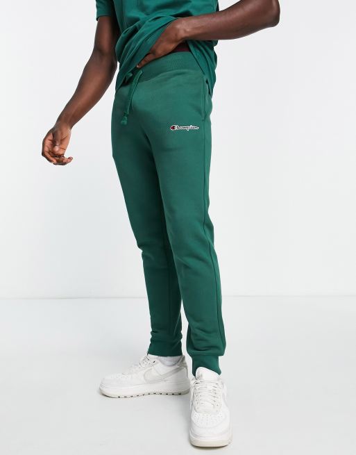 Champion – Jogginghose in Grün mit kleinem Logo | ASOS