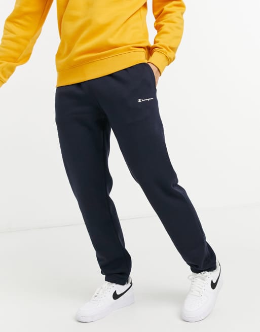 Champion – Jogginghose in Marineblau Logo-Schriftzug ASOS | mit