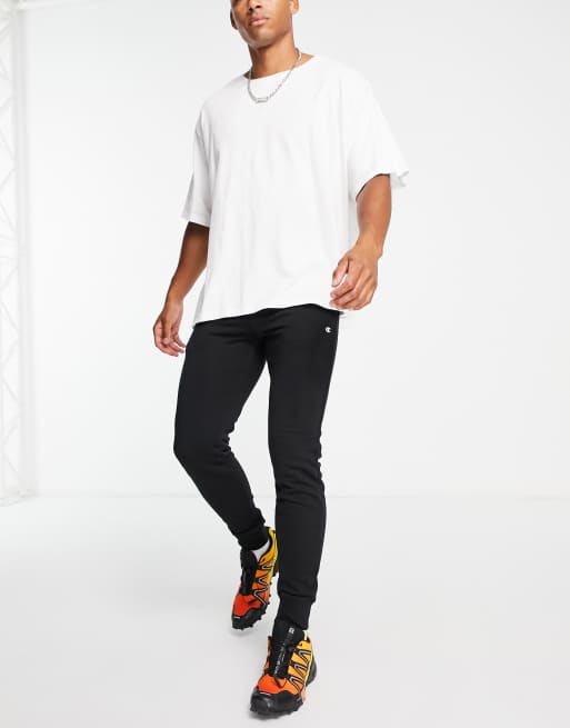 Champion – Jogginghose in Schwarz mit Logo