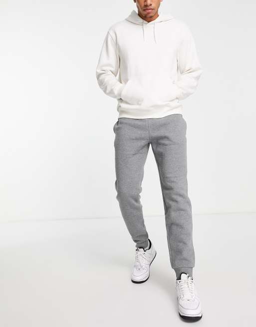 Champion – Jogginghose mit kleinem Logo in Grau