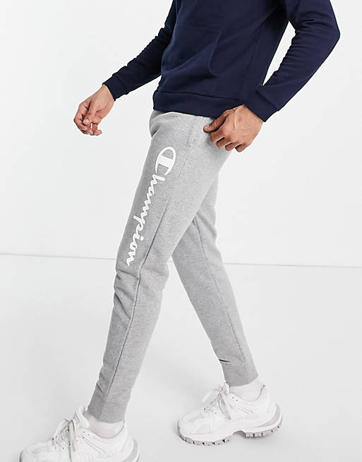 Tracksuits Champion large script logo joggers in grey 