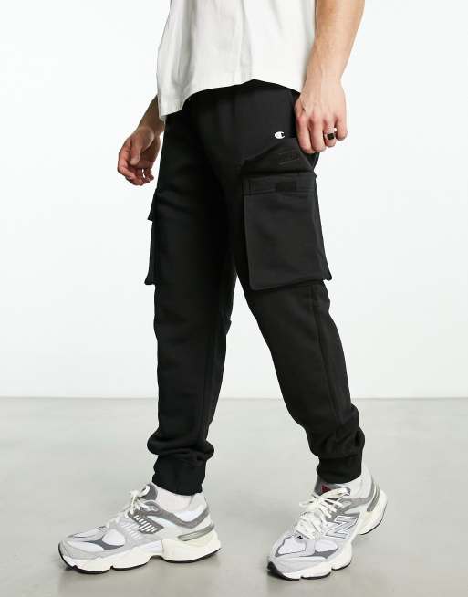 Champion Legacy cargo joggers in black | ASOS