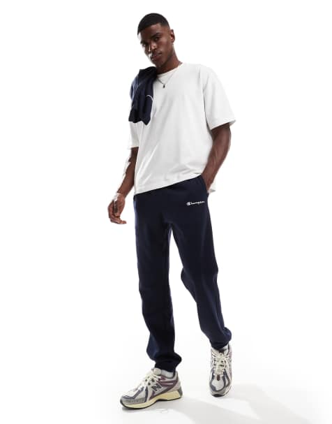 Champion Legacy cuffed trackies in navy - view 1
