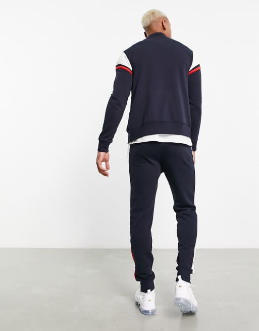 Champion best sale navy tracksuit