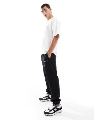 Champion – Legacy – Jogginghose in Schwarz mit Bündchen - view 1