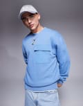 Champion Legacy pocket crew neck sweatshirt in blue