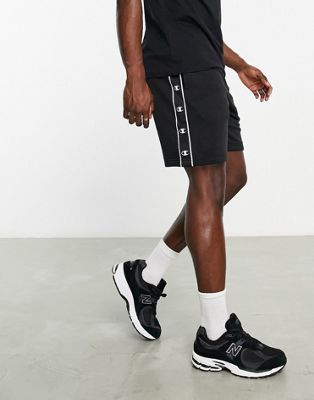 Champion Legacy shorts with tape detail in black