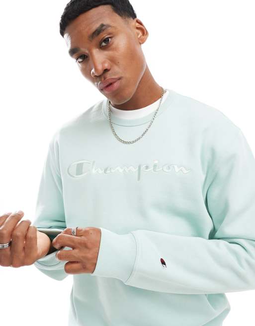 Champion – Legacy – Sweatshirt in Hellblau mit mittigem, farblich abgestimmtem Logo