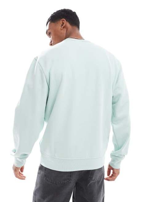 Champion Legacy tonal center logo sweatshirt in light blue ASOS