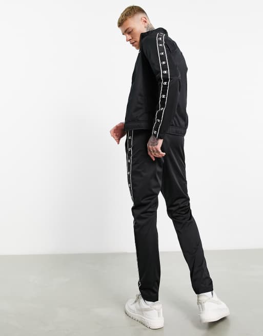 Champion Legacy tracksuit with tape detail in black ASOS