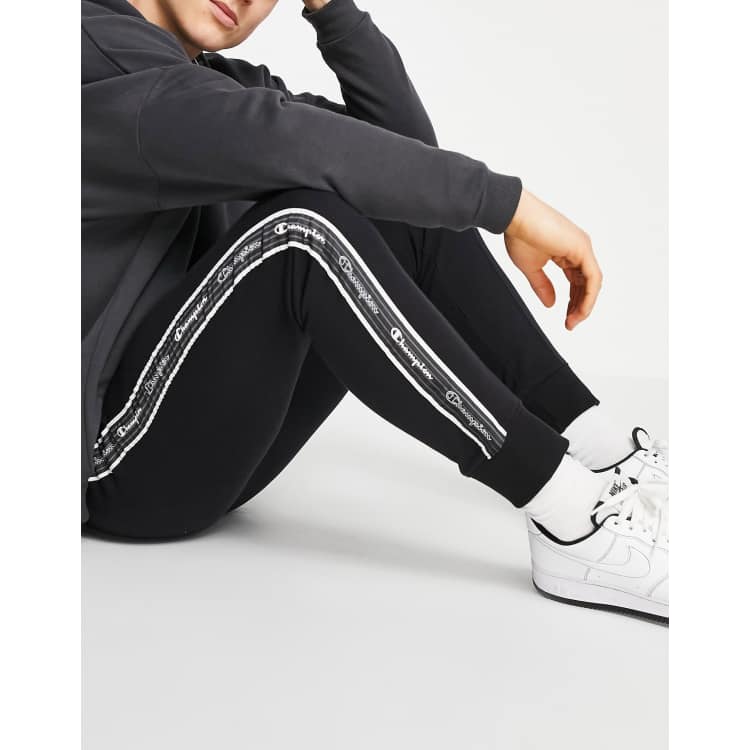 Champion taped track pants womens best sale