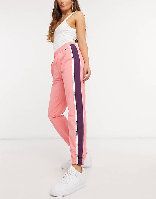 Champion logo track pants in pink
