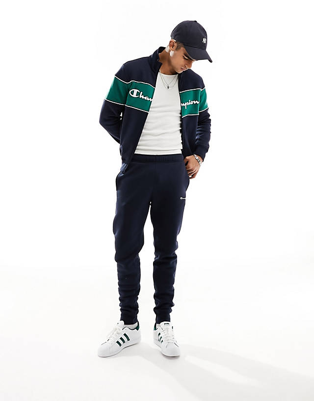 Champion - logo tracksuit in black and green
