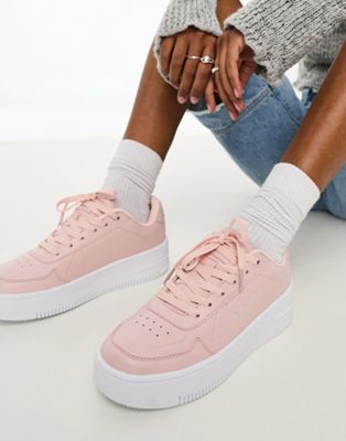 Champion Rebound 2.0 low trainers in blush and white